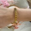 Bracelet/jonc en acier inoxydable doré motif étoile