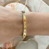 Bracelet/jonc en acier inoxydable doré et émail multicolore