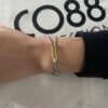 8CB-90753-1 Bracelet Co88 France en acier inoxydable doré et tissu gris