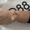 Bracelet Co88 France en acier inoxydable doré et pierre naturelle noire