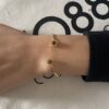 Bracelet Co88 France en acier inoxydable doré et pierre naturelle oeil de tigre