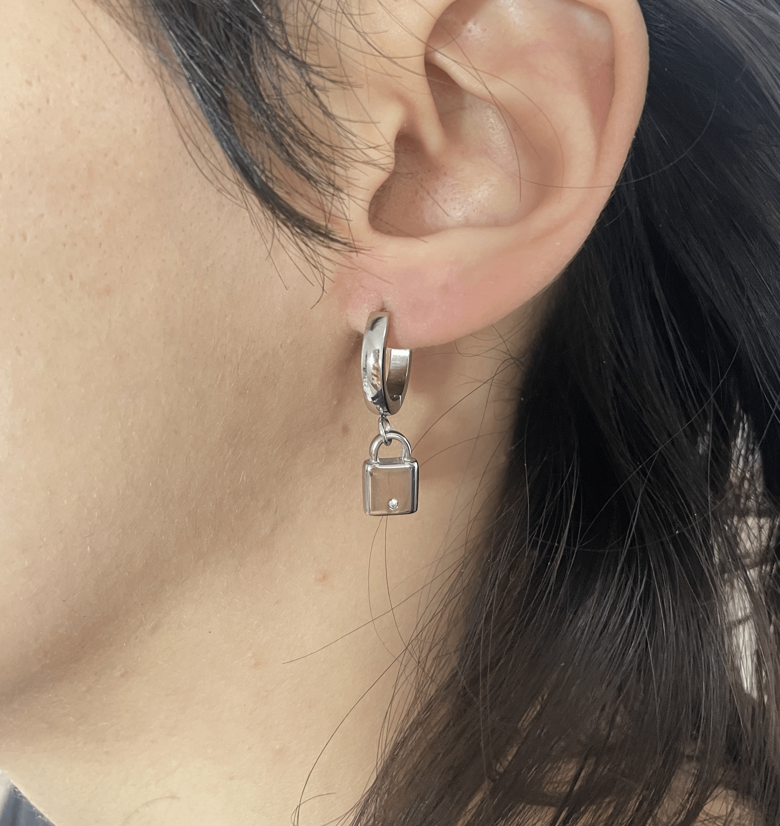 Boucle d'oreille Co88 France en acier inoxydable argenté
