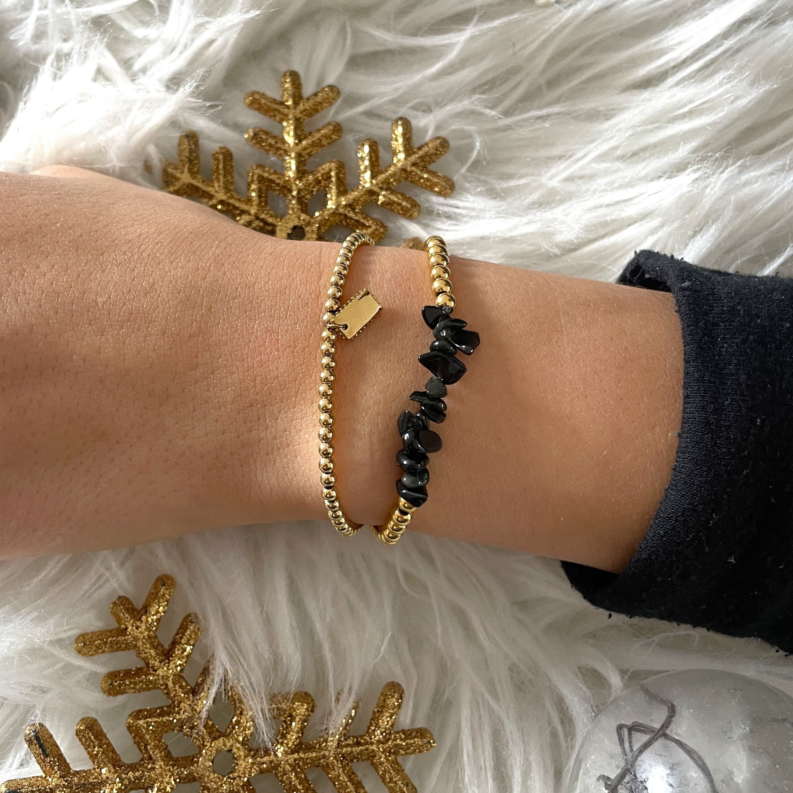 Composition de bracelet Co88 France en acier inoxydable doré et pampille, pierre naturelle noire