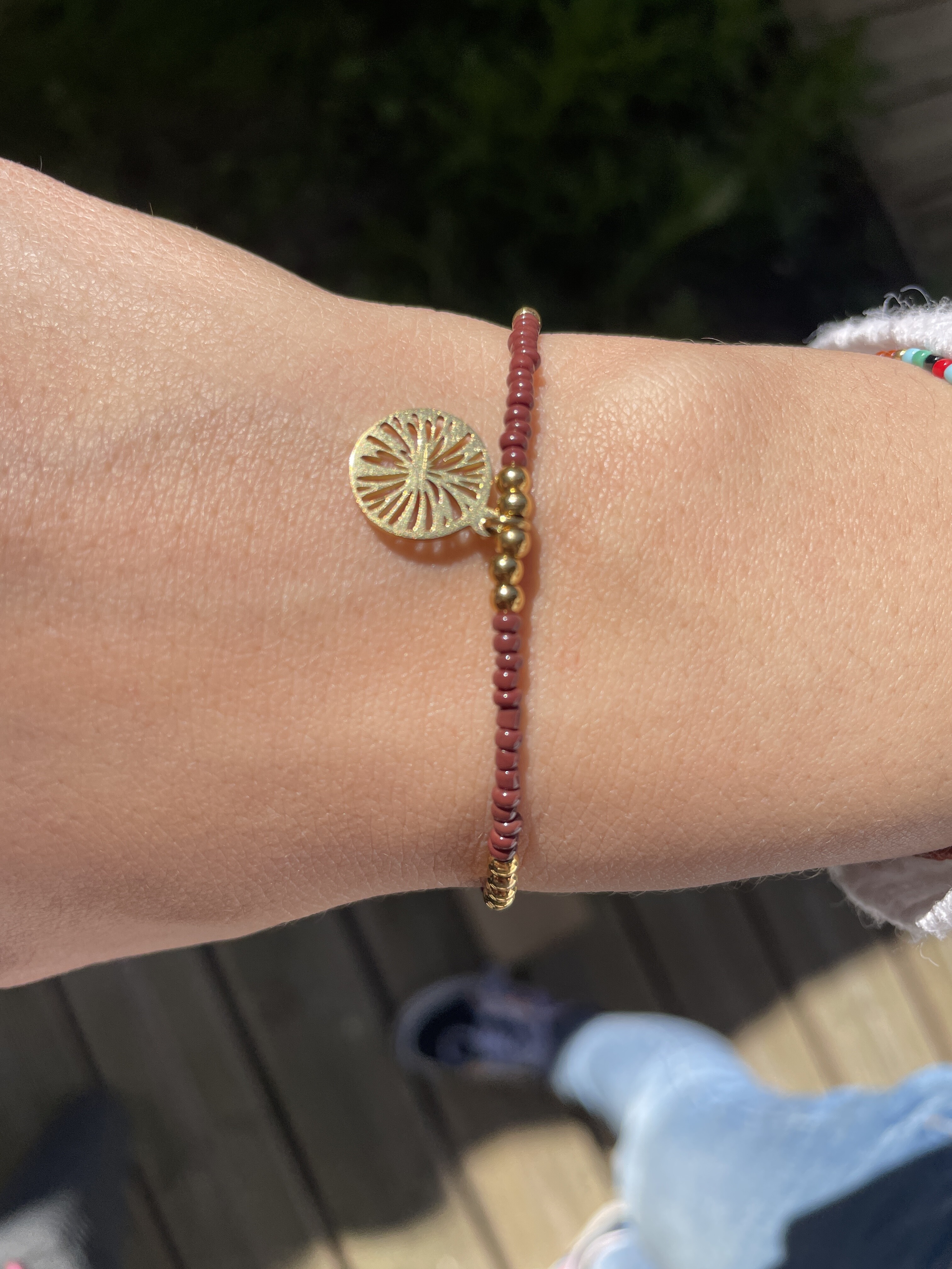 image00001 Bracelet Co88 France en acier inoxydable doré et perles marrons, pampille dorée